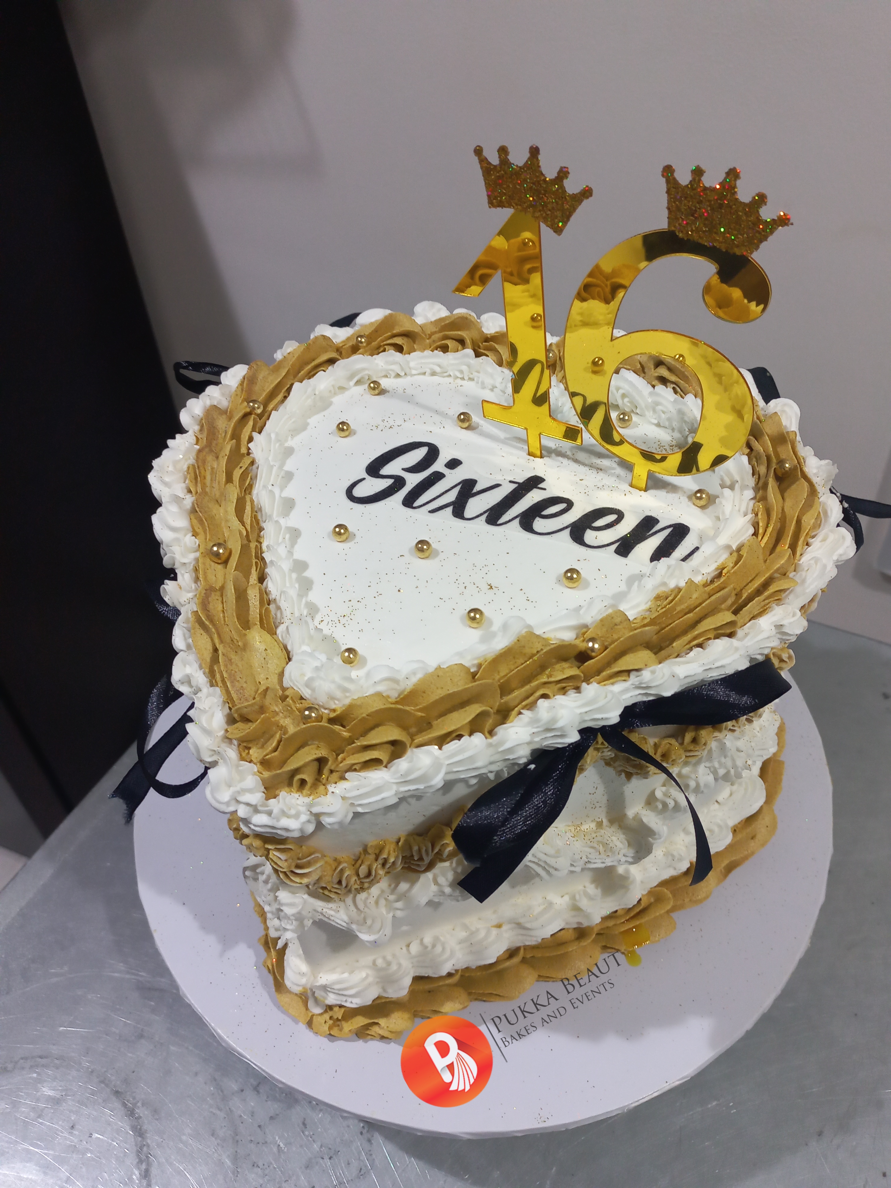 Gold ruffled heart-shaped Sweet Sixteen birthday cake by Pukka Beaut